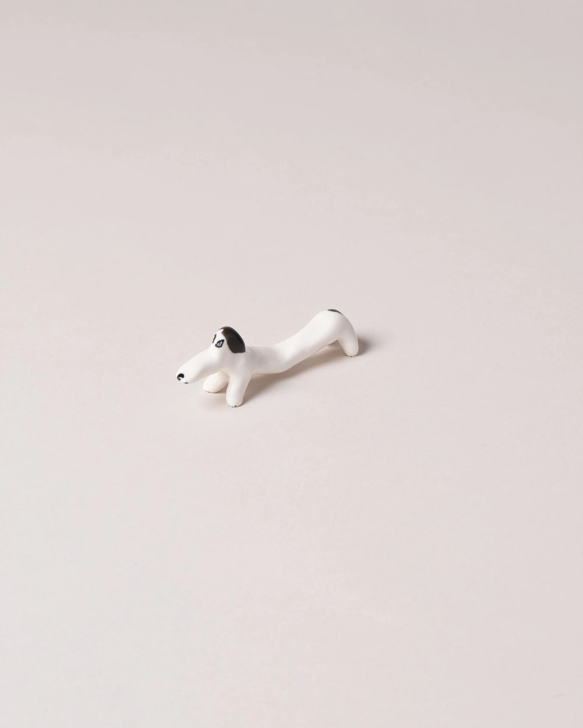 Black Ears Chopstick Dog Rest